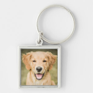 Ein Porträt eines golden retriever-Welpen Schlüsselanhänger