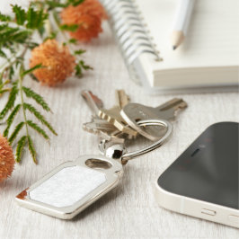 ein Rahmen aus schwarz-weißem Foto mit weißem Hint Schlüsselanhänger