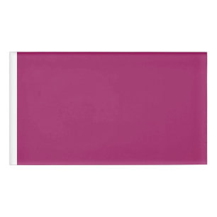 ein rosa Hintergrund mit weißem Rand Namenschild