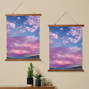 Ein rosa leuchtender Sonnenaufgang Wandteppich Mit Holzrahmen