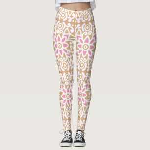 ein rosa-weiße Blume-Muster auf braunem Hintergrun Leggings