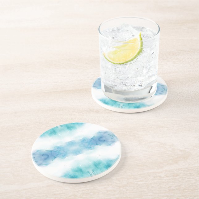 Ein runder Teller mit einem Wasserfarben-Design  Getränkeuntersetzer (Seite)