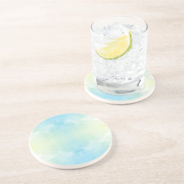 Ein runder Teller mit einem zarten Aquarelldesign Getränkeuntersetzer