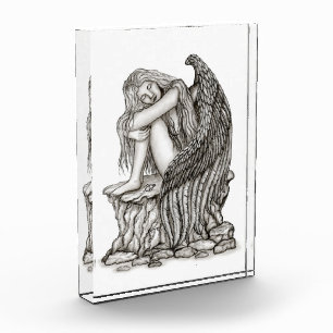 Ein schlafender Engel auf dem Stein Fotoblock