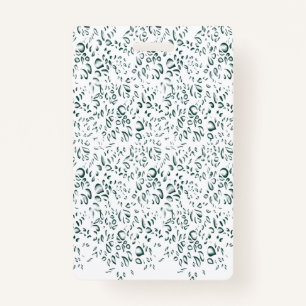 Ein silberner Tropfen spritzt in einen Pool mit we Ausweis