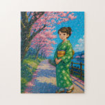 Ein Spaziergang unter Kirschblüten - Japanischer K Puzzle<br><div class="desc">Treten Sie ein in einen friedlichen Frühlingstag in Japan mit diesem wunderbar illustrierten 252-teiligen Puzzle. Dieses Puzzle, das ein junges Mädchen in einem traditionellen, grünen Kimono mit Blumen beherbergt und auf einem Flussweg durch lebendige Kirschblüten geht, ist eine perfekte Mischung aus Ruhe und Charme. Ob Sie ein Fan der japanischen...</div>