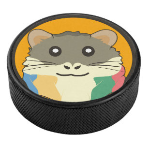 Ein spielerischer und lustiger Hamster Eishockey Puck