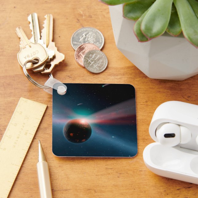 Ein Sturm von Kometen im Eta Corvi-System. Schlüsselanhänger (Schreibtisch)