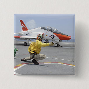 Ein tireur an Bord des Flugzeugträgers Button