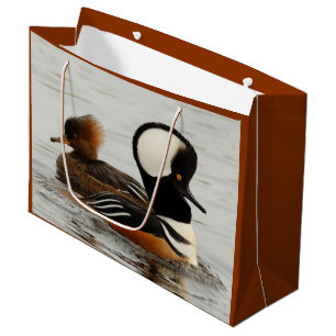 Ein Treffen gehobener Merganser Große Geschenktüte