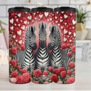 Ein Trio von Zebras in einem Garten des Herzens un Thermosbecher