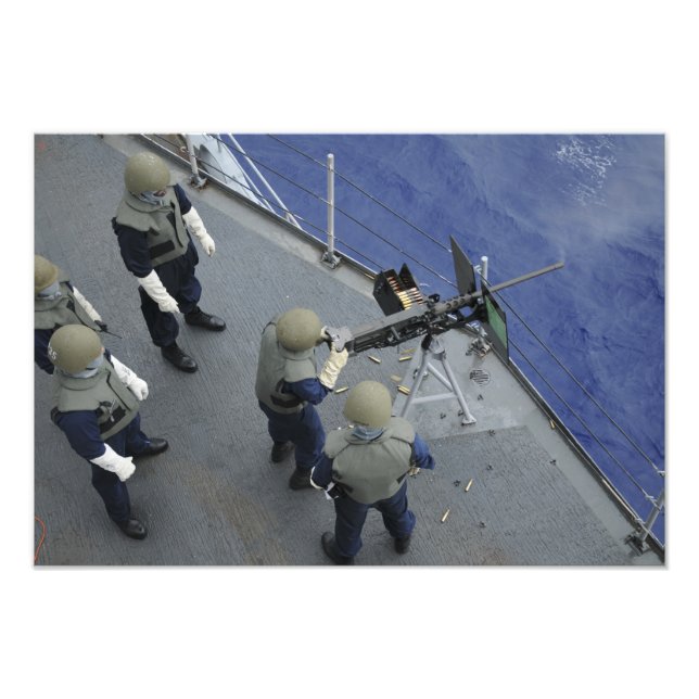 Ein US-Seeleute feuert einen 50-Kaliber M2HB Fotodruck (Vorne)