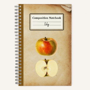 Ein Vintager Apple und ein halber Personalisierter Notizbuch