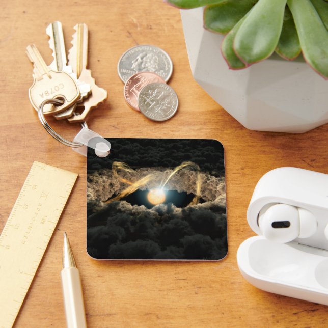 Ein von einer protoplanetären Diskette umgebener S Schlüsselanhänger (Schreibtisch)