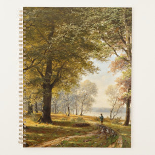 Ein Waldweg mit Wanderer im Herbst Planer
