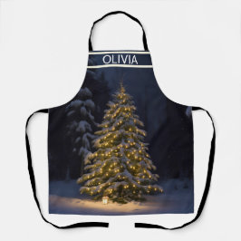 ein Weihnachtsbaum wird in einem schneebedeckten W Schürze