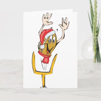 Ein Weihnachtsfußball mit einem Weihnachtsgeschenk Feiertagskarte