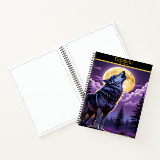 Ein Wolf heult auf Vollmond auf einem Skizzenbuch Notizbuch