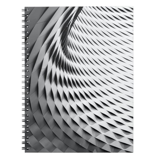 Eine abgerundete Fassade mit weißem Kunstwerk Notizblock (Vorderseite)