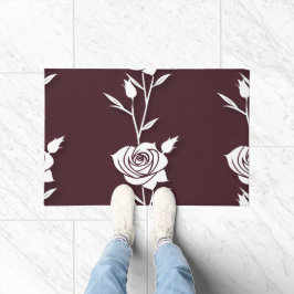 Eine Anordnung minimalistischer Rosen in einer Lin Fußmatte