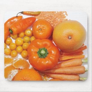 Eine Auswahl der orange Früchte u. des Gemüses Mousepad