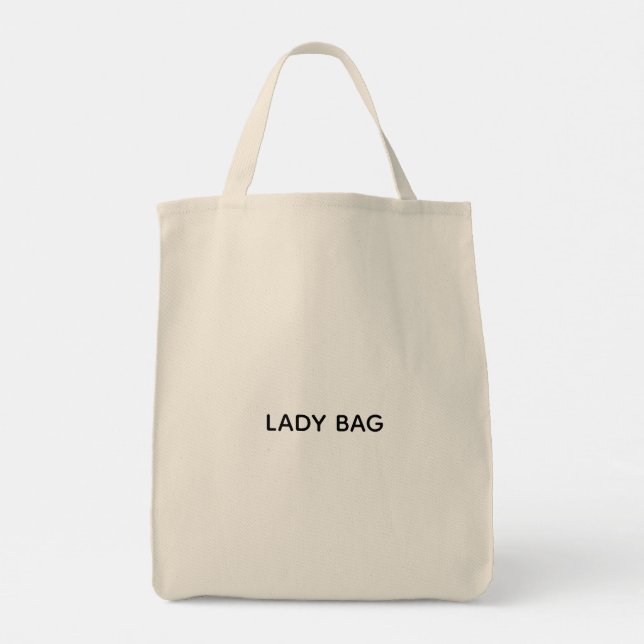 Eine beigefarbene Tasche mit dem Text "LADY BAG" b (Rückseite)