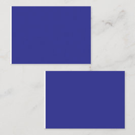 eine blaue Wand mit Uhr Platzkarte