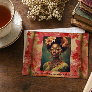 "Eine Blume in ihrem Haar, eine Herzrevolution." Postkarte