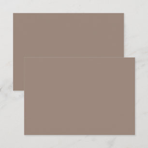 eine braune Mauer mit Dankeskarte