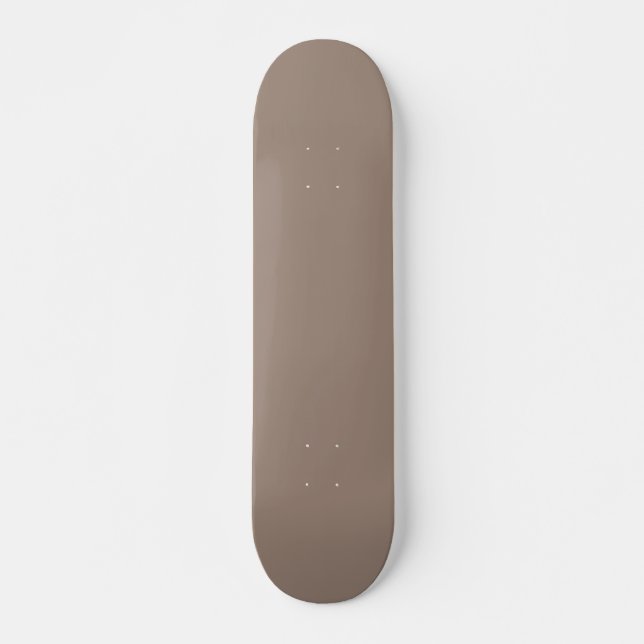eine braune Mauer mit einer Uhr darauf Skateboard (Vorne)