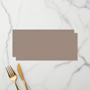 eine braune Mauer mit Menükarte