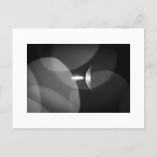 Eine brennende Kerze Postkarte