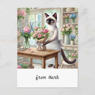 Eine charmante Katze sorgt für eine schöne Blume Feiertagspostkarte