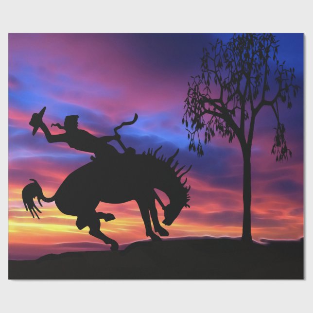 Eine Cowboy-Silhouette bei Sonnenuntergang Geschenkpapier (Flach)