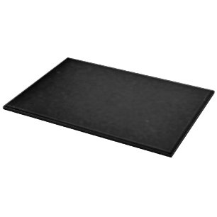 Eine durchgehend schwarze Textur füllt das gesamte Schneidebrett