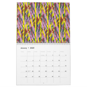 Eine flauschig graue Katze mit grünen Augen sitzt  Kalender