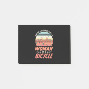 Eine Frau auf dem Fahrrad Post-it Klebezettel