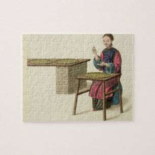 Eine Frau, die Tee zubereitet, überziehen 21 'vom Puzzle