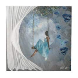 Eine Frau in blauem Kleid auf einer Schaukel Fliese