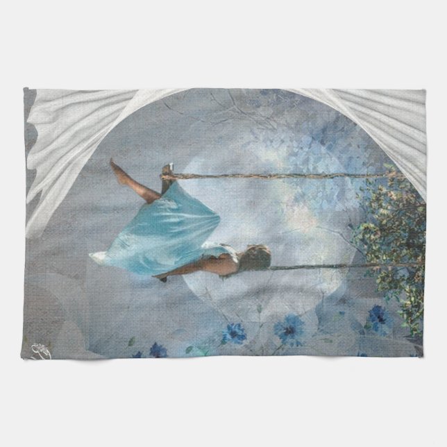 Eine Frau in blauem Kleid auf einer Schaukel Geschirrtuch (Horizontal)