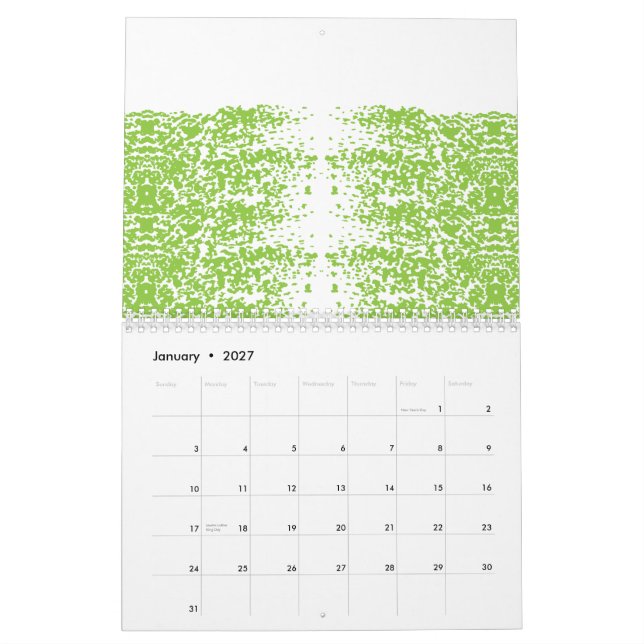 Eine Frau mit einem grauen Pullover und einer Bril Kalender (Jan 2027)