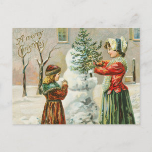 Eine frohe Weihnachtsfrau, Kind und Schneemann-Fei Feiertagspostkarte