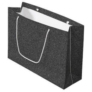 Eine graue Geschentktasche mit weißen Seilgriffen Große Geschenktüte