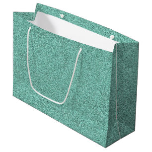 Eine grüne Geschenktasche mit Glitter und weißen G Große Geschenktüte