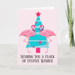Eine Herde festlicher Weihnachtswünsche Flamingos Feiertagskarte