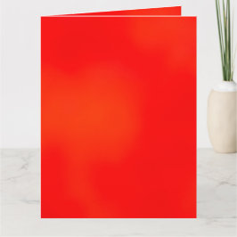 Eine Karte mit einem kräftigen rot-orangen Farbver