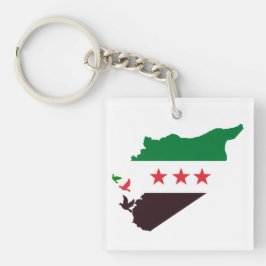 Eine Karte Syriens mit der "Revolution Flag" Schlüsselanhänger