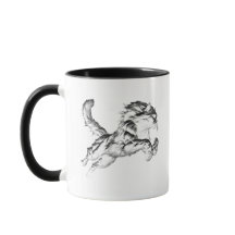 Eine Katze, die in Schwarz-Weiß springt.