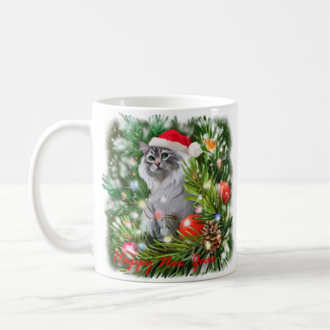Eine Katze im Hut des Weihnachtsmanns und ein Weih Kaffeetasse (Links)
