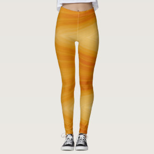 Eine lebendige orangefarbene Farbe "Ratti_Creative Leggings